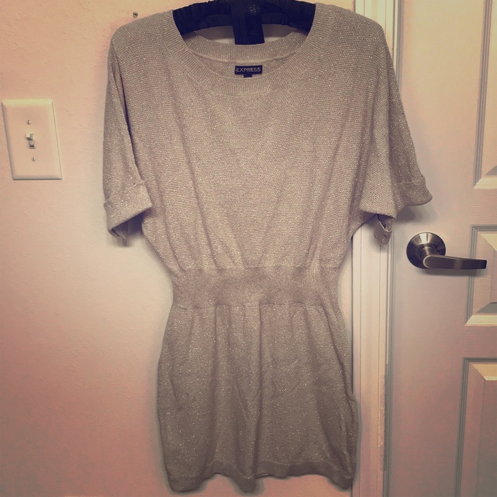 Beige tunic with metallic embellishments!